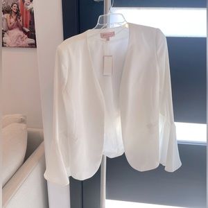 White jacket. Brand new with tag